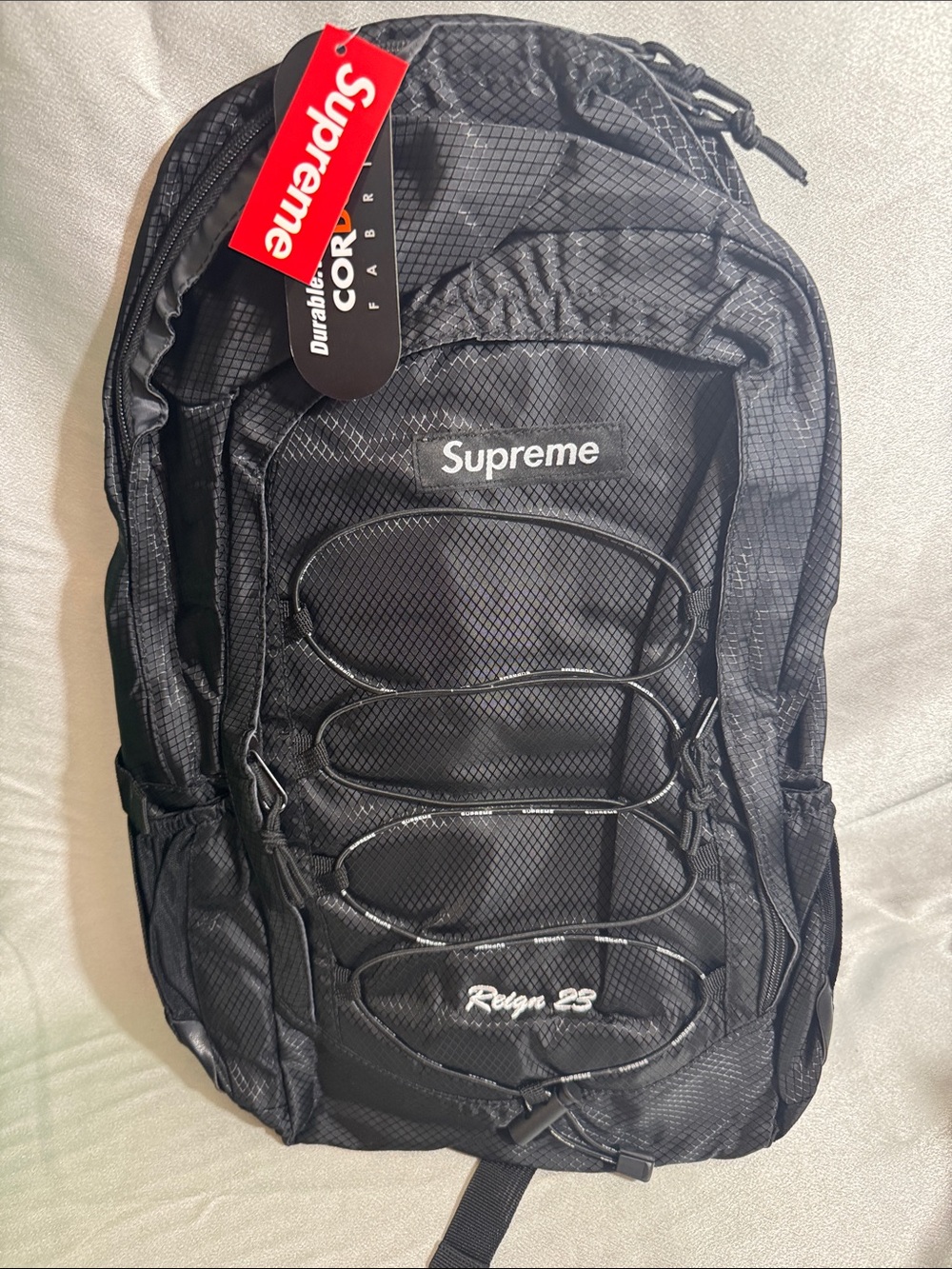 New!🔥Supreme Black Reign 23 Bungee-Front Backpack!🔥